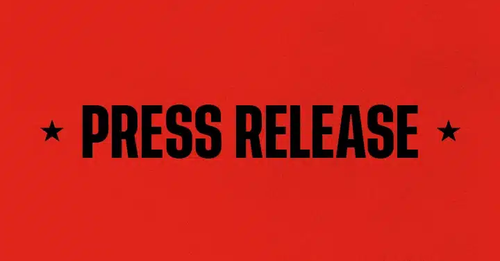 Post card for press releases with black "Press Release" and stars on a red background.